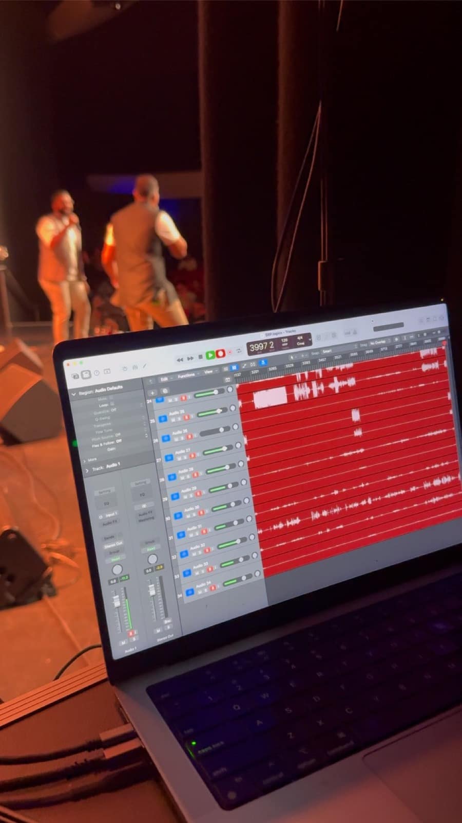 A MacBook Pro running Logic Pro with a multitrack recording session capturing every input from the recital